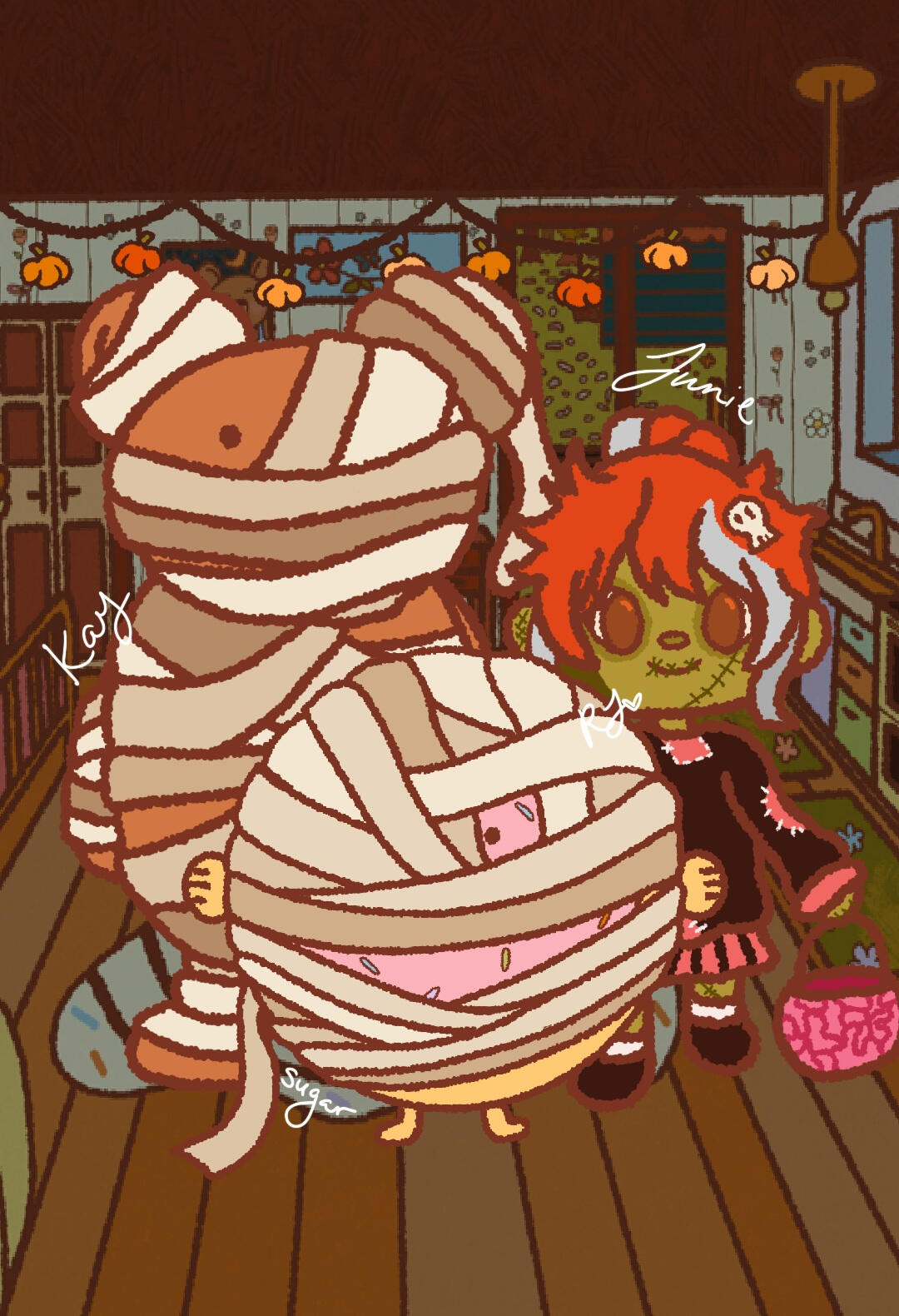 Kay dressed as a mummy with Sugar and Junie in Halloween costumes